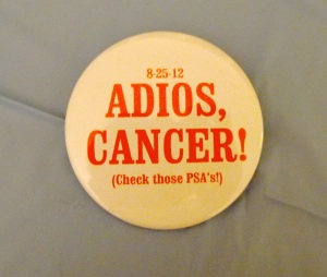 adios cancer button with date and "(Check those PSA's!)"